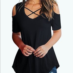 Cold shoulder tee shirt with cross cross detail .
